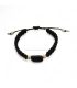 bracelet with schorlo tourmaline in the center, made of black macramé.